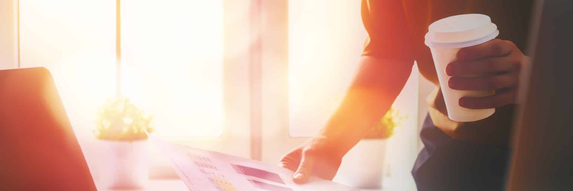 Close up business woman signing documents.